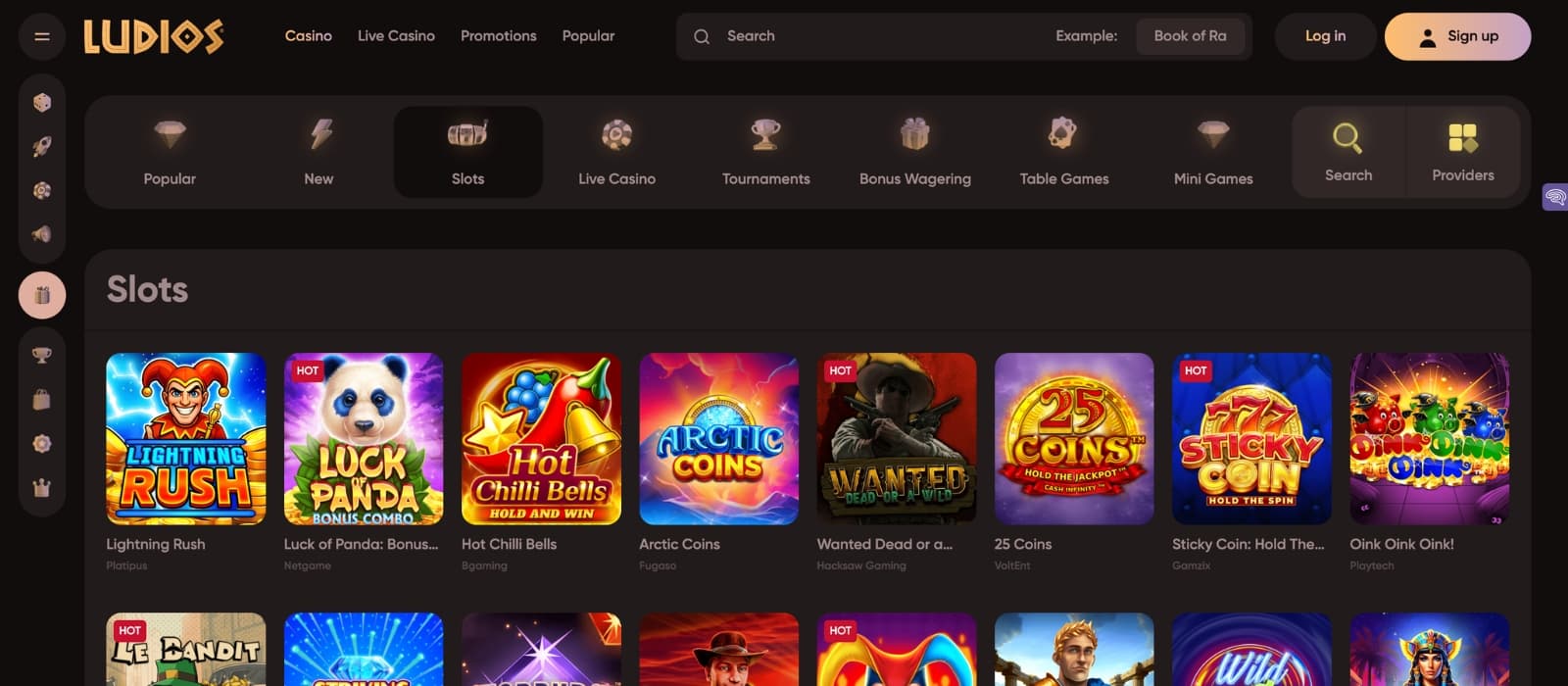 Slot game interface on Ludios showing spinning reels and controls