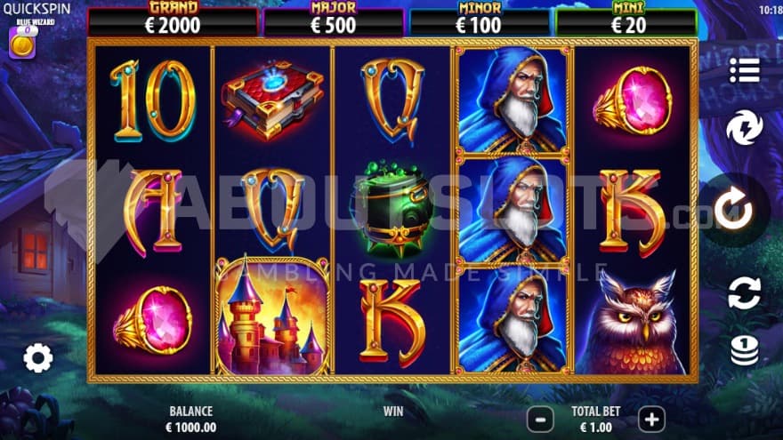 The playing grid set in a dark forest with a small cabin in the background