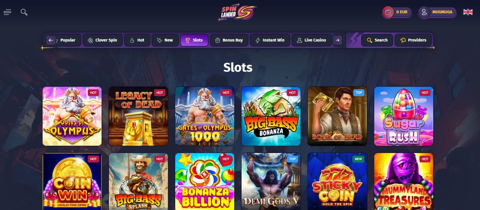 The games page of Spinlander Casino displays slot games, such as Legacy of Dead, Book of Dead, and more.