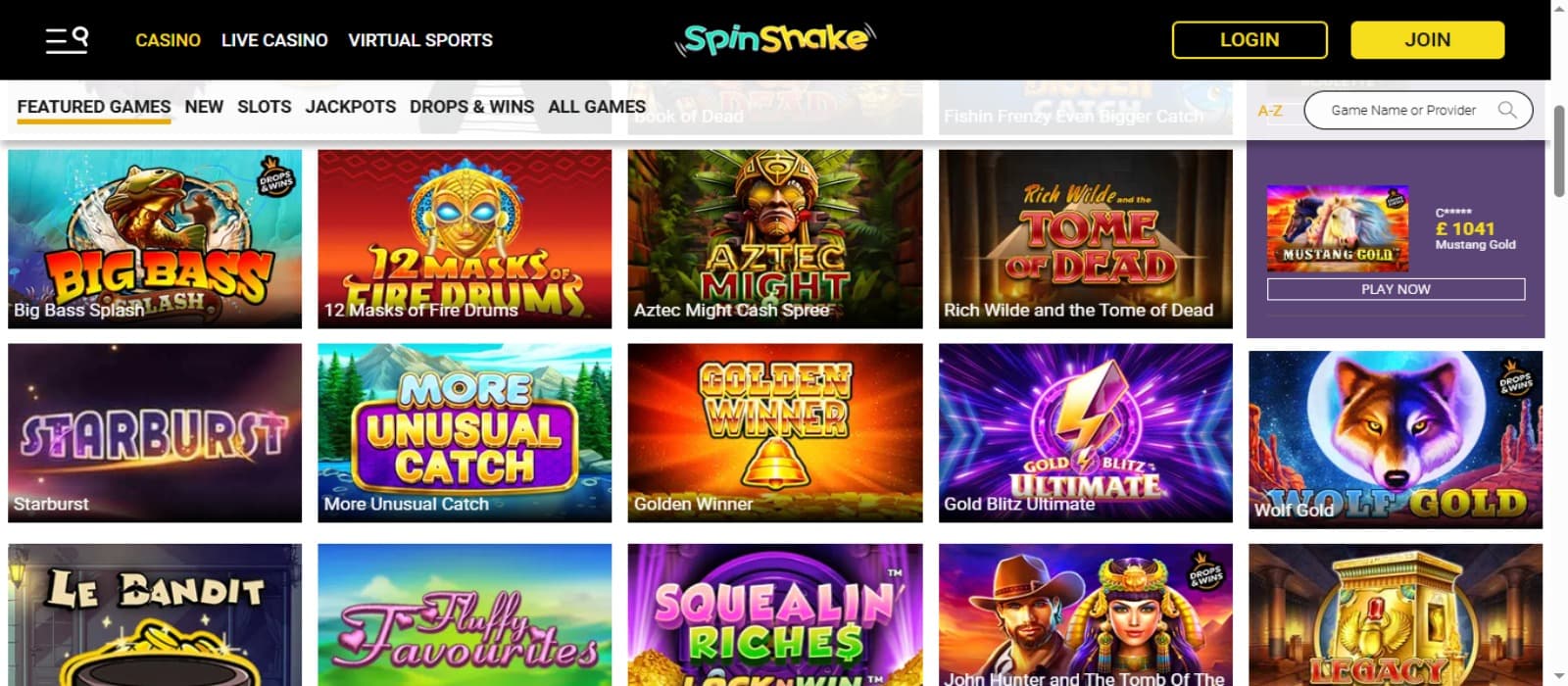 SpinShake Casino games page with the colorful slot game icons and top navigational menus with game categories options