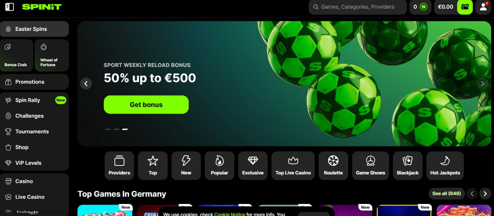 SPINiT casino landing page with a green sports bonus banner, left-side navigation, and quick-access tiles for providers, top games, live casino, roulette, blackjack, and jackpots.
