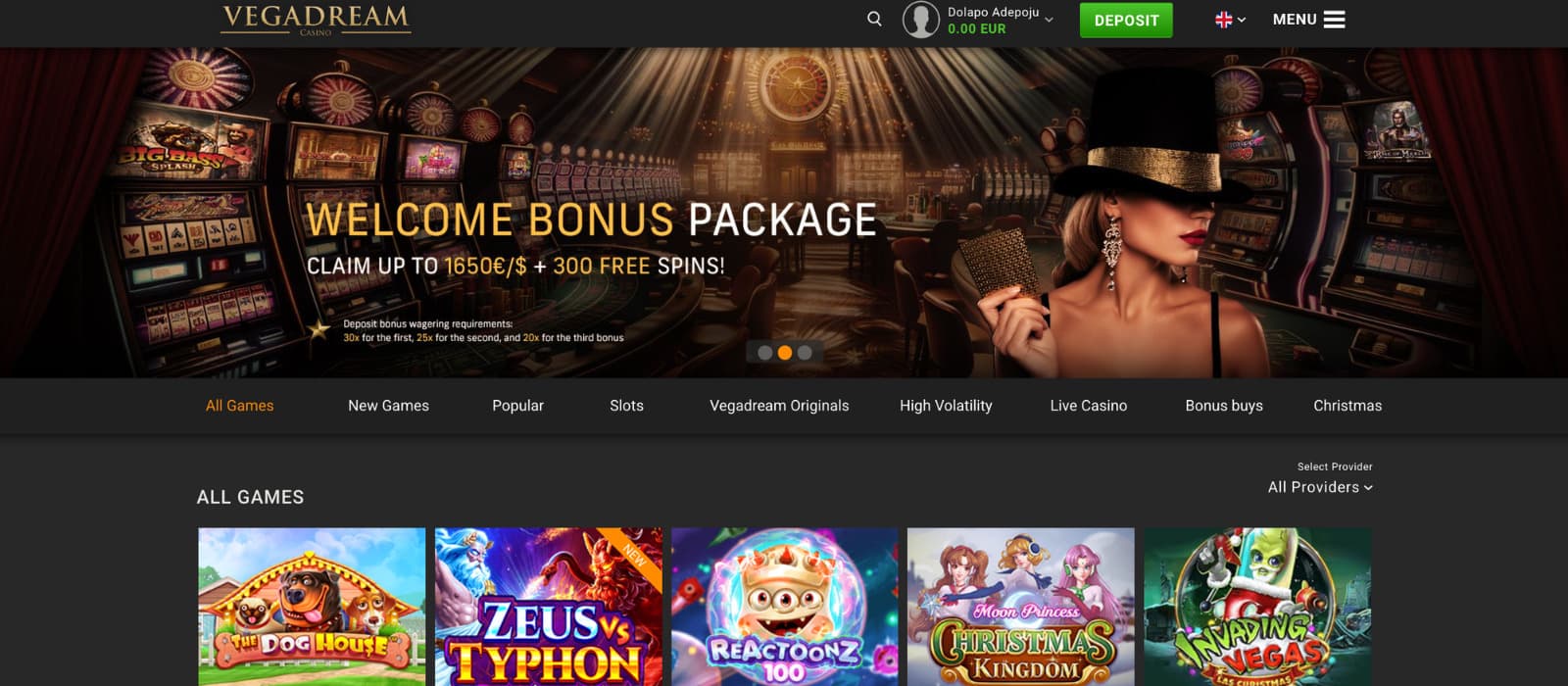 Vegadream Casino landing page displaying the homepage hero banner with the welcome bonus package, casino navigation menu, and featured slot games highlighted below the main promotion.