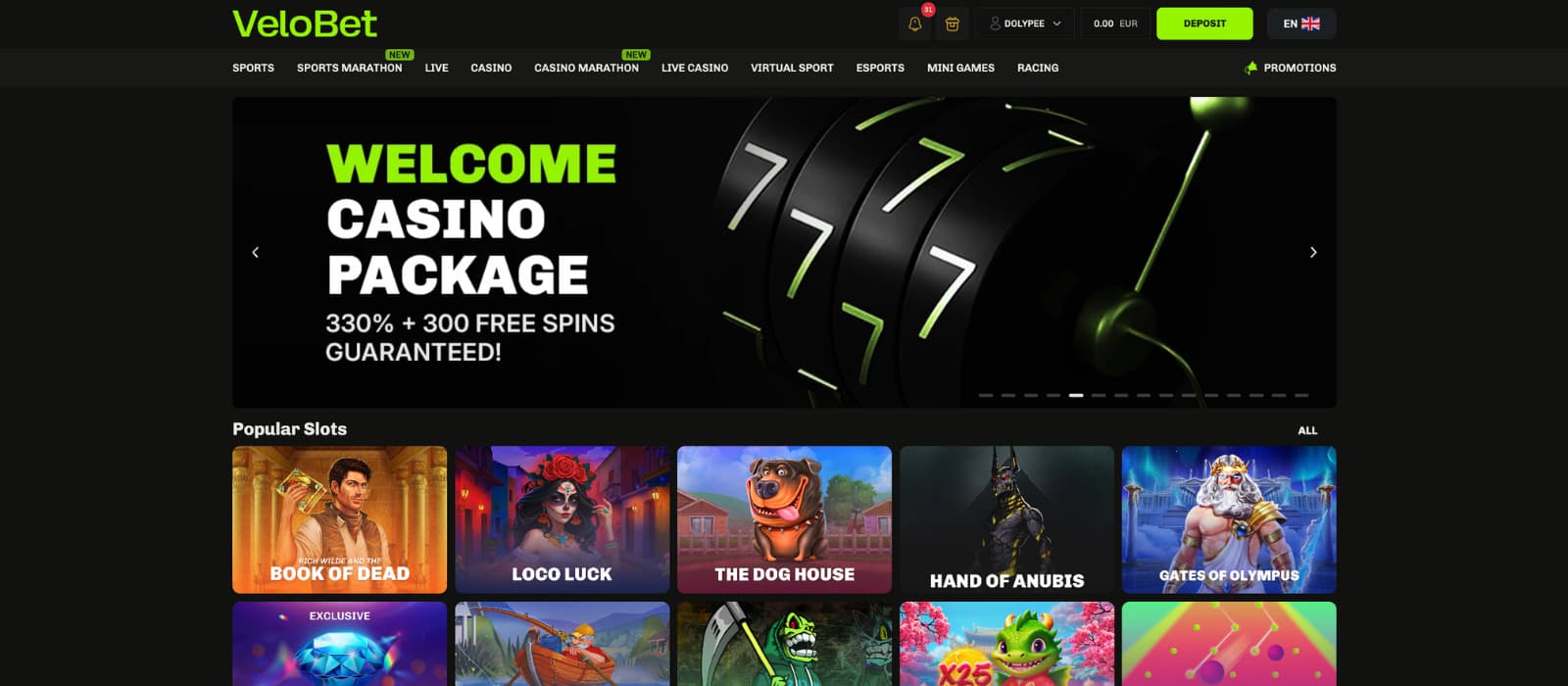 VeloBet casino homepage featuring a welcome bonus banner and popular slot selections.