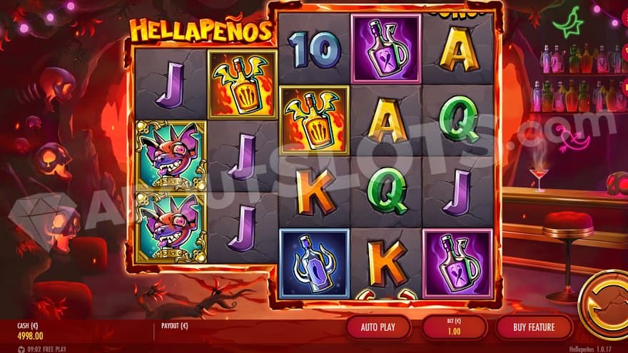 A casino slot in a bar with death skulls.