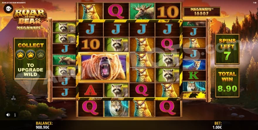 Free Spins bonus game with two collected gold paws on the left.