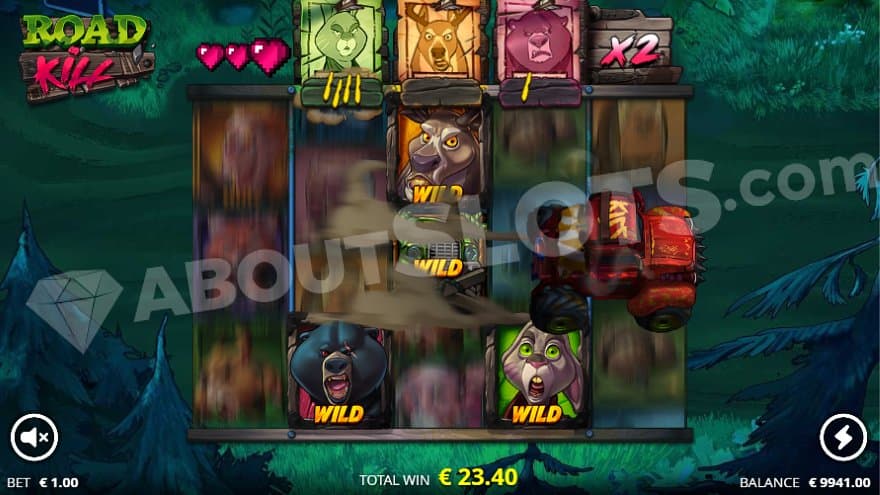 A red car drives over the casino slot. 