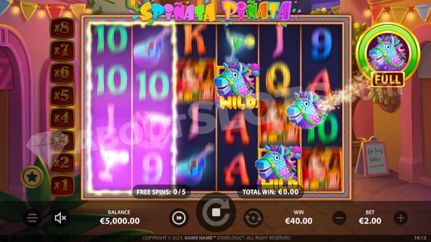 Free Spins bonus game with a pinata spin being performed.
