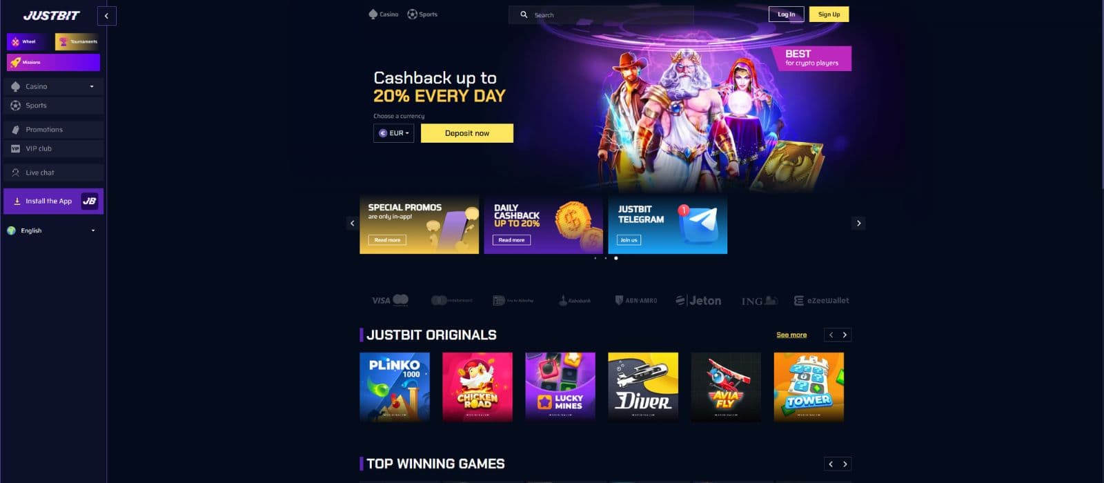 JustBit casino landing page showing the cashback offfer, promos, and the main menu to the left