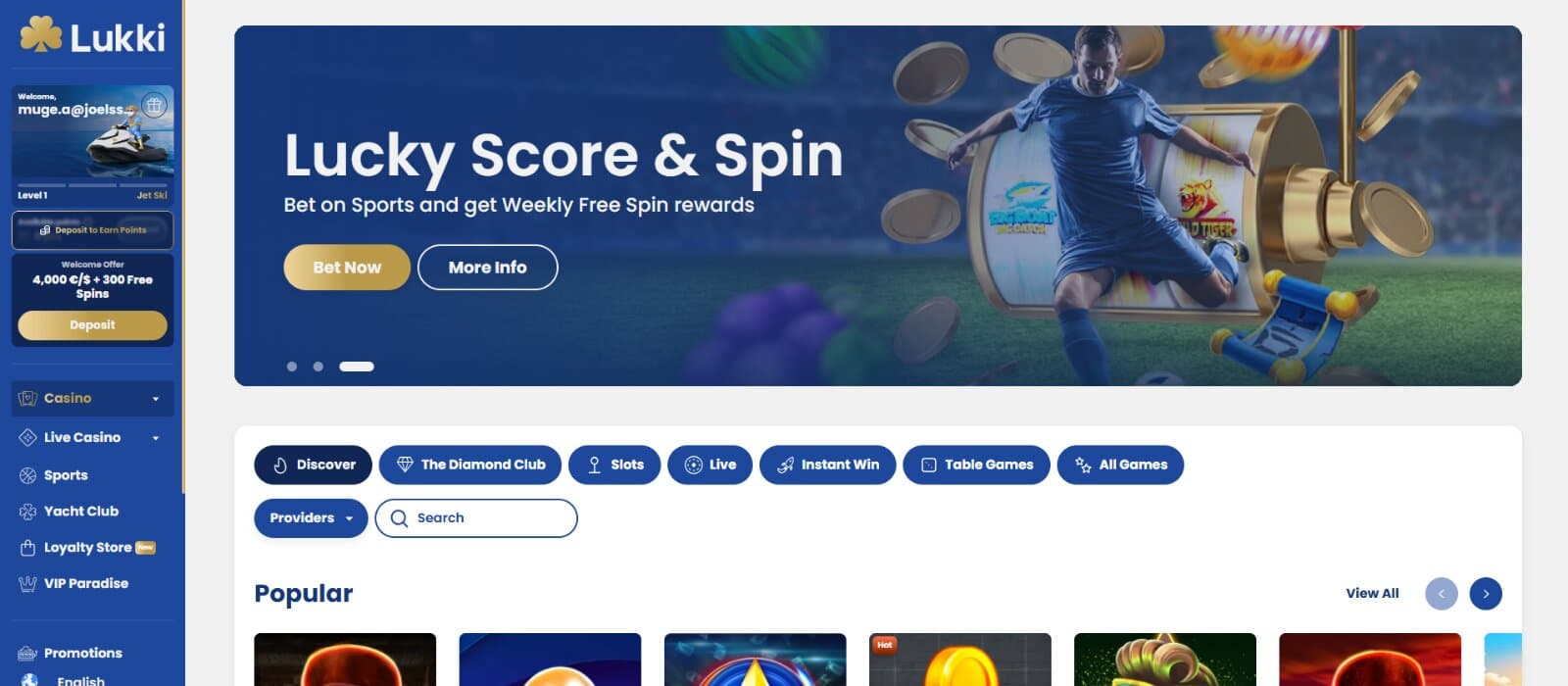 Lukki Casino homepage with a Lucky Score & Spin sports betting banner offers weekly free spin rewards.