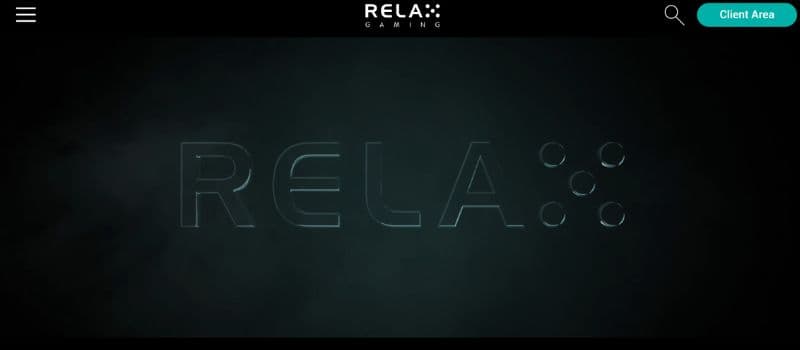 The logo of relax gaming showing against a dark background.