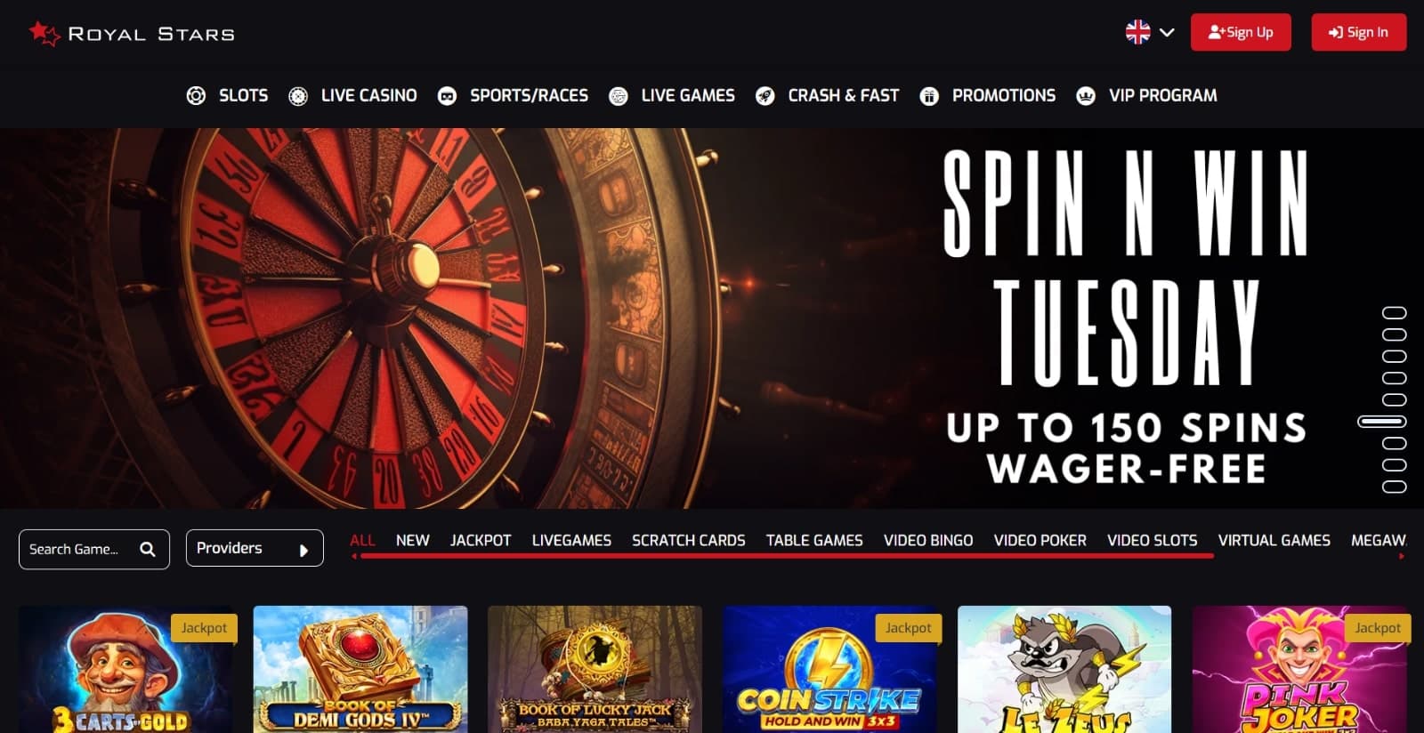 Royal Stars Casino's landing page featuring the Spin N Win promotion over image of roulette wheel, with featured game selection and menu tabs 