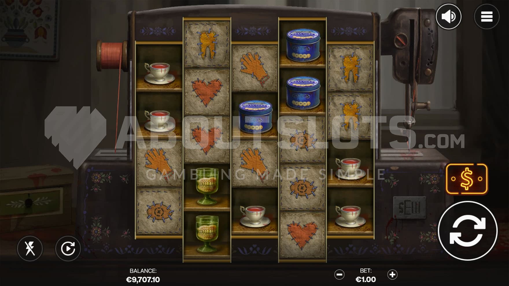 Base Game view of a 5-reel grid on a backdrop of a creepy house with sewing machine standing in the middle.