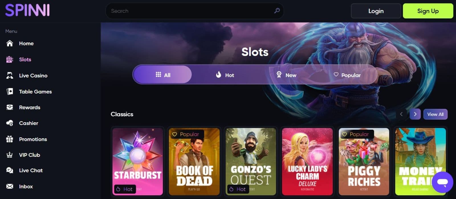 Spinni Casino's slot games section, showing titles like Starburst, Book of Dead, and other classic slots.