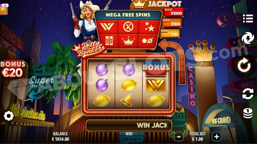 The strip in Las Vegas at nighttime with the slots three reels in the middle of the game.