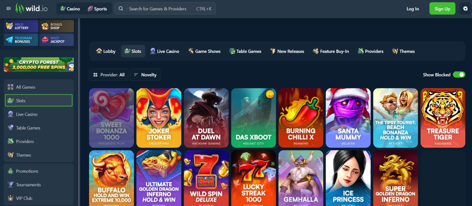 Wild.io Casino games page with slots under category tabs 