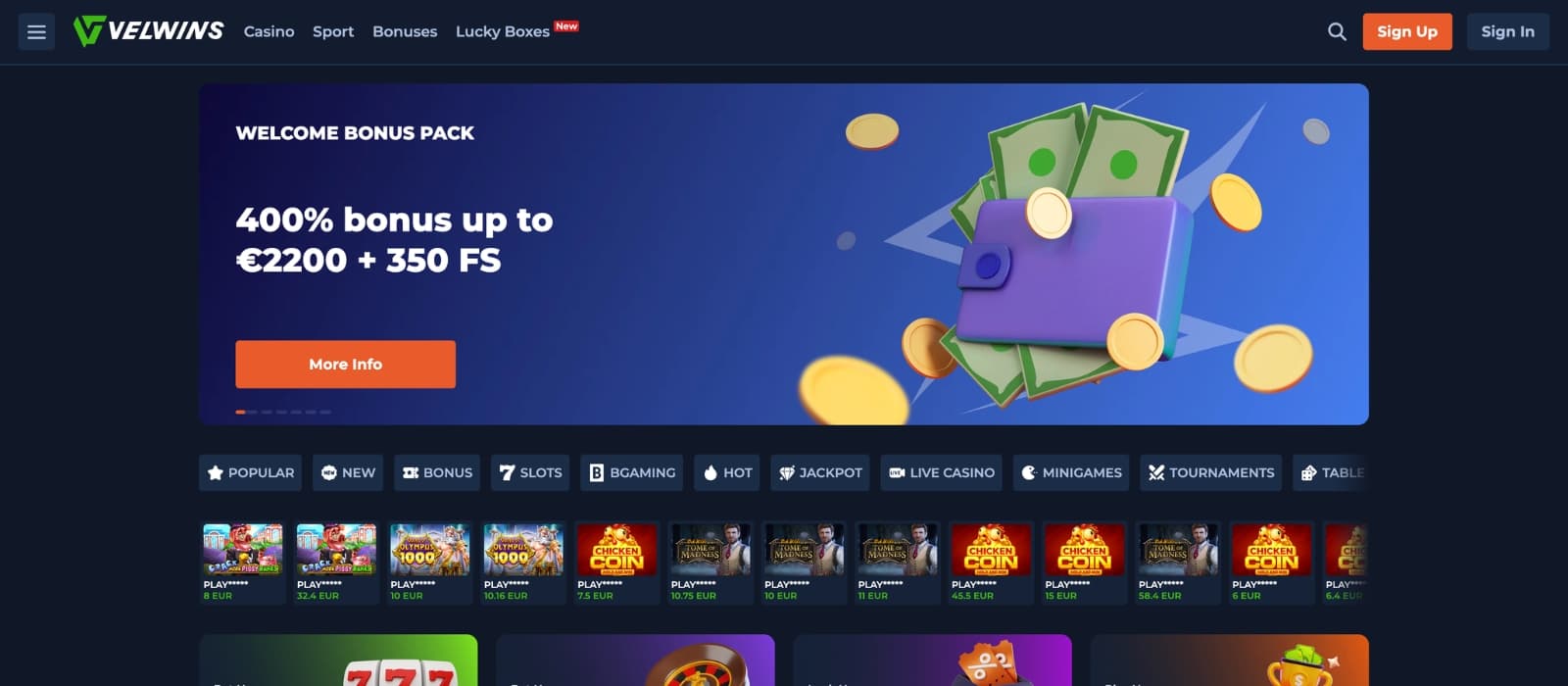 Velwins Casino homepage with welcome bonus banner and featured slots