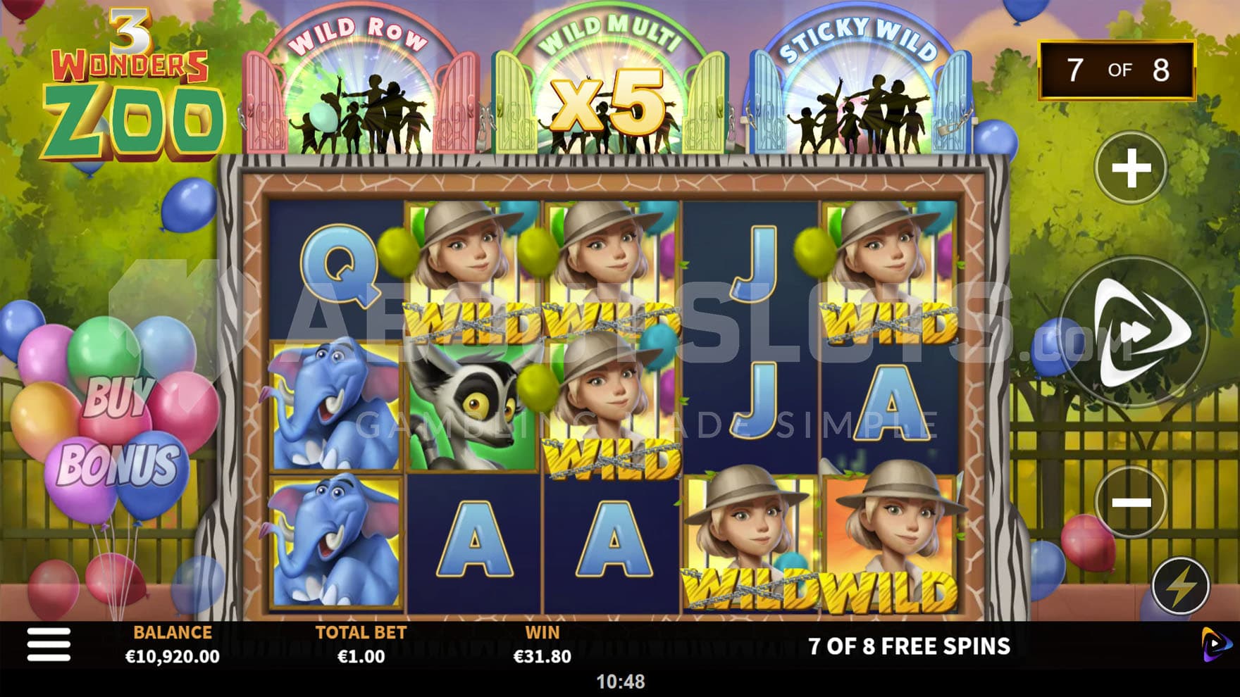 Free Spins bonus in progress, showing multiple Sticky Wilds on the grid and an active x5 multiplier.