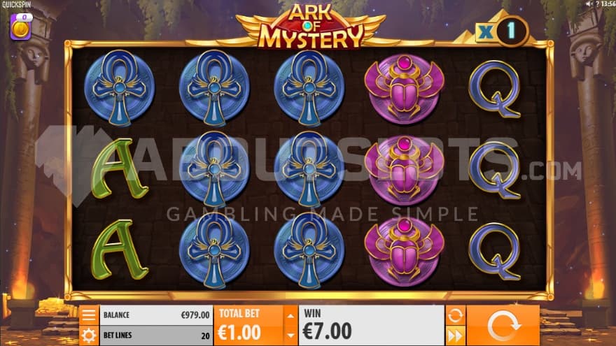 Base Game set inside a egyptian tomb with various artifacts like ankhs and scarabs crowding the reels