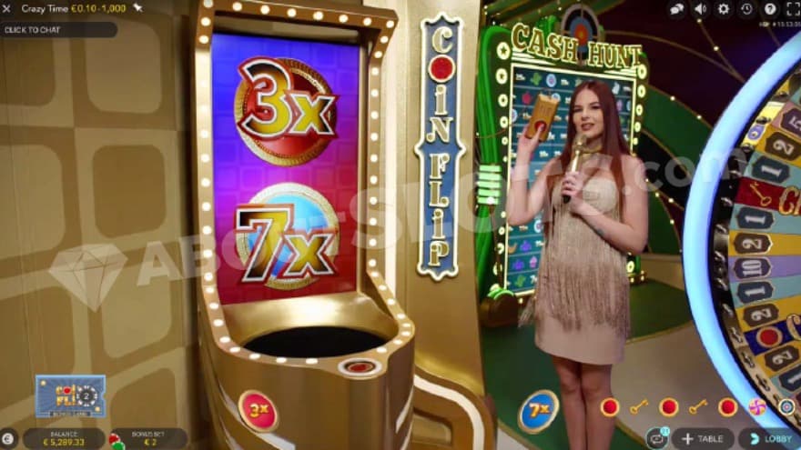 Coin Flip bonus feature with a game host standing on the right side, holding a remote with a red button.