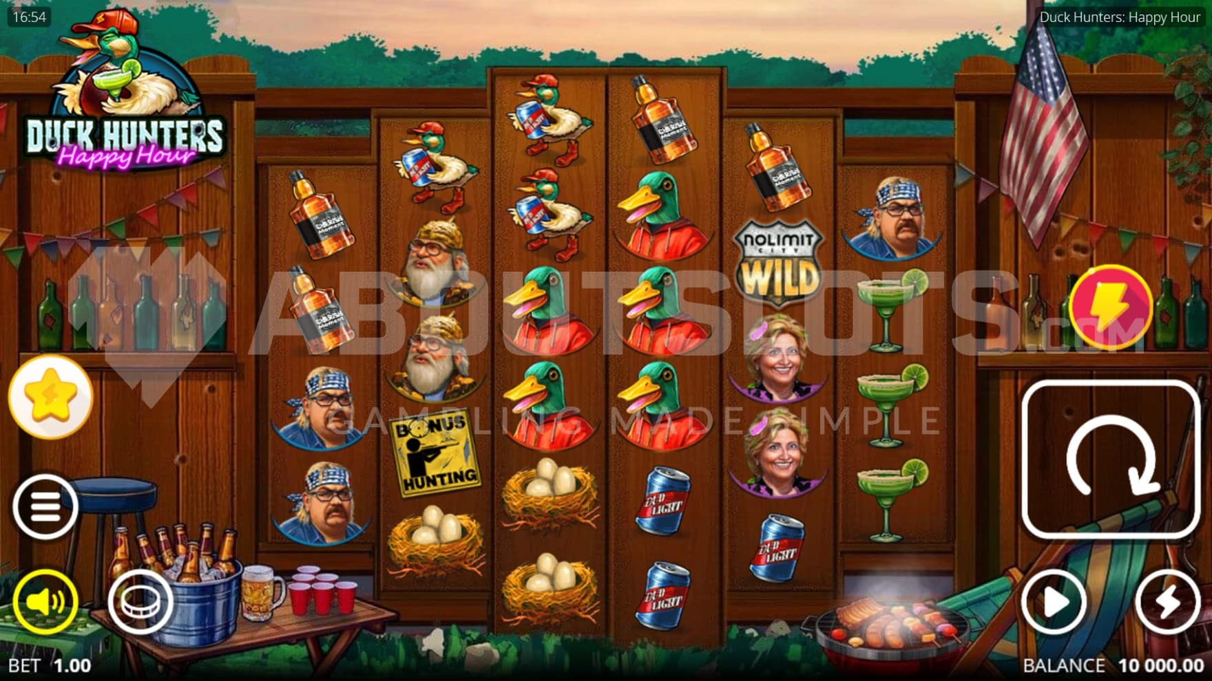 The playing grid is built into a fence, filled with bottles and surrounded by lawnchairs, grills, and more alcohl