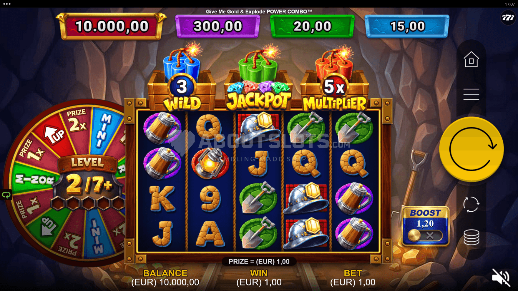The gold mine playing grid is decorated with the Dynamite Boxes and Fortune Wheel features