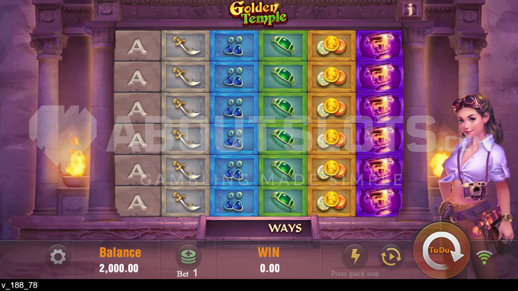 The explorer Hannah stands next to the reels that are filled with riches