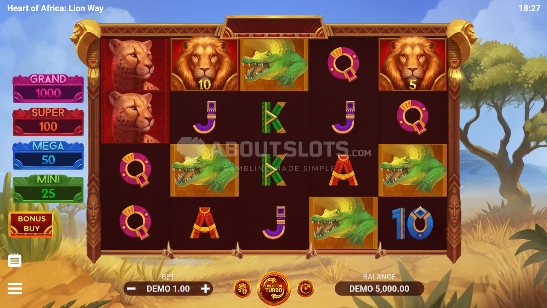 The game is set out on the savannah, with its playing grid built with tribal decoration