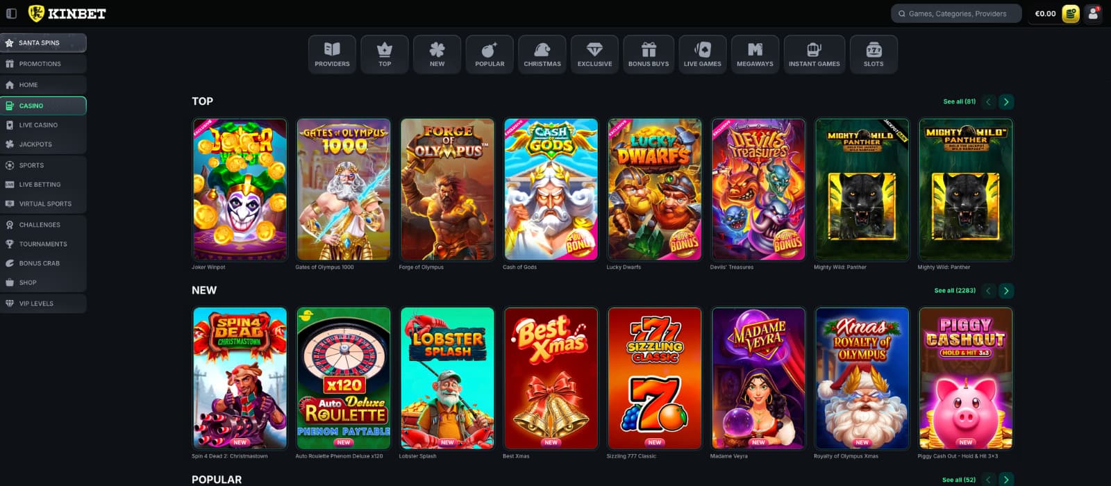 Kinbet Casino homepage showing the welcome bonus banner and featured slot games on the main lobby.