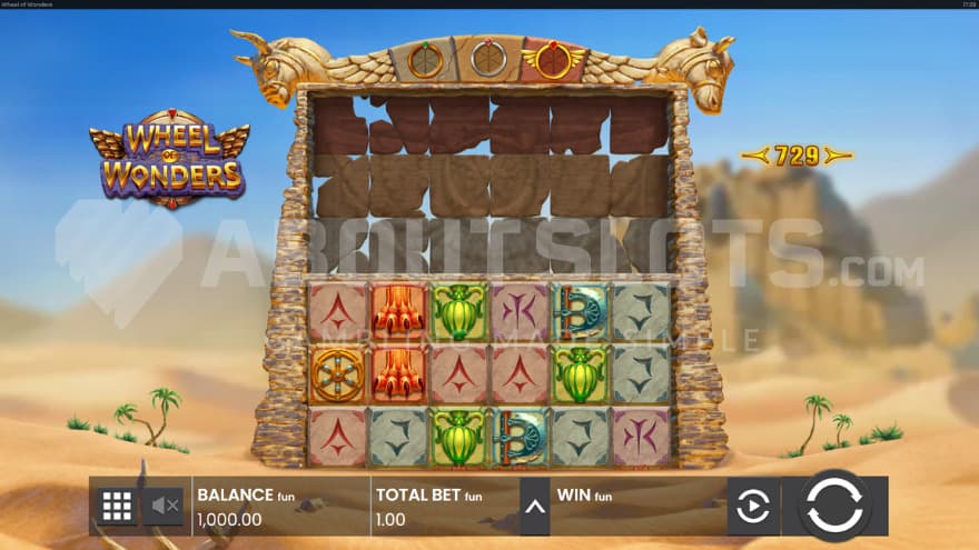 Base game with a desert in the background of the reels.