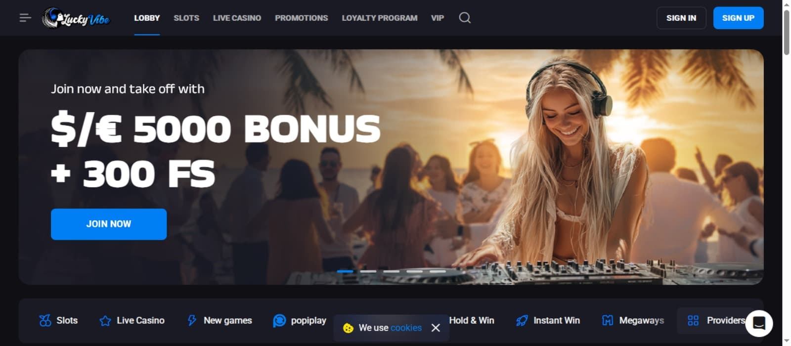 Lucky Vibe Casino landing page with the welcome bonus offer banner displaying a women DJ in a party, game categories below and top navigation menus