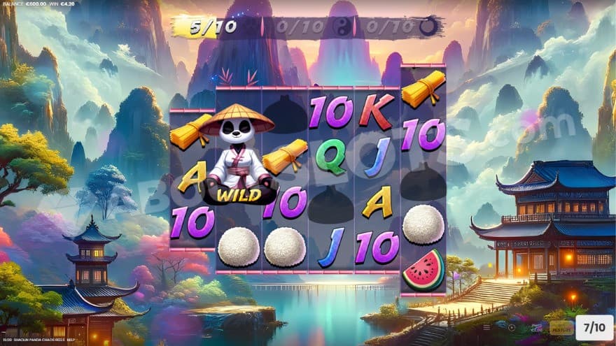 Free Spins feature with a majestic background in the background showing a tranquil town, with high mountains.