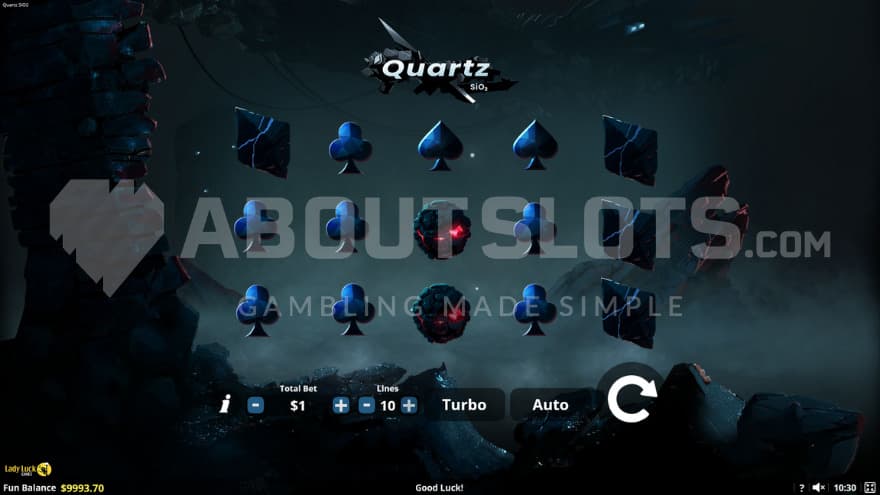 The playing grid set on a dark planet with various illuminated and omnious cliffs in the background