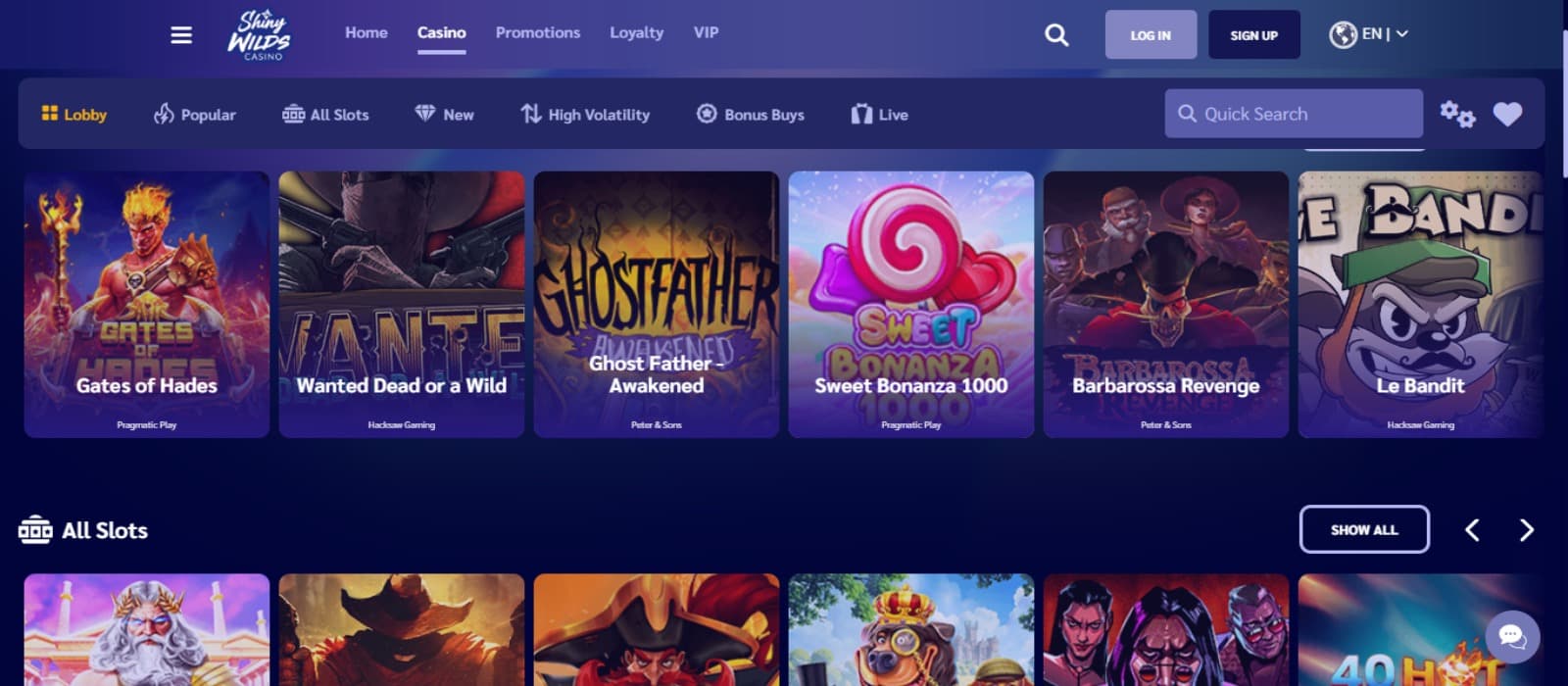 ShinyWilds Casino games page with the colorful slot game icons, game categories and other navigational menus at the top