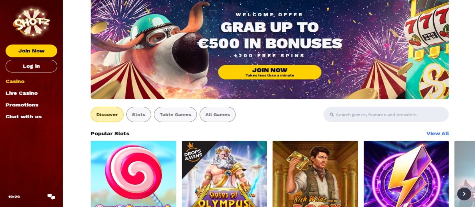 Shotz Casino landing page with the welcome bonus offer banner having animated animals and slot game icons below