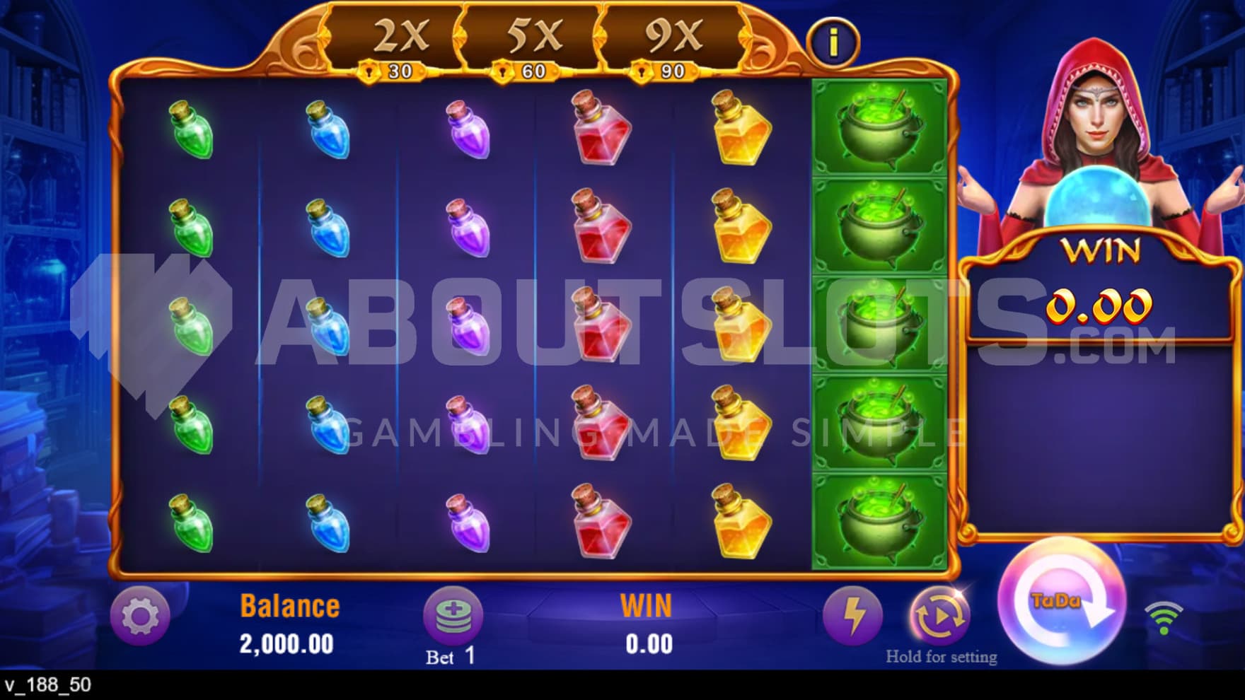 Natasha the witch sits next to the playing grid with her scrying orb