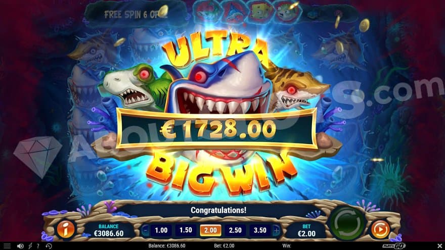 A picture with the game's three sharks on top of the reels saying: "Ultra Big Win."