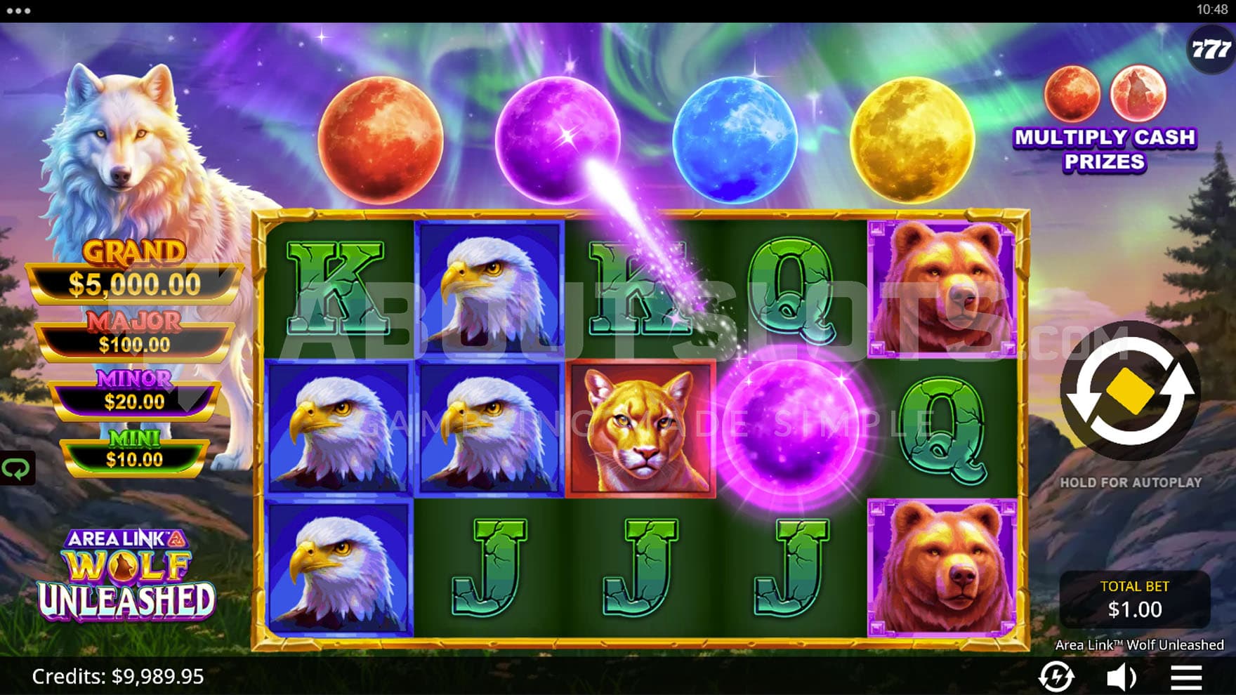 Base Game view of a 5x3 grid on a backdrop of a natural landscape with a white wolf standing on the left.