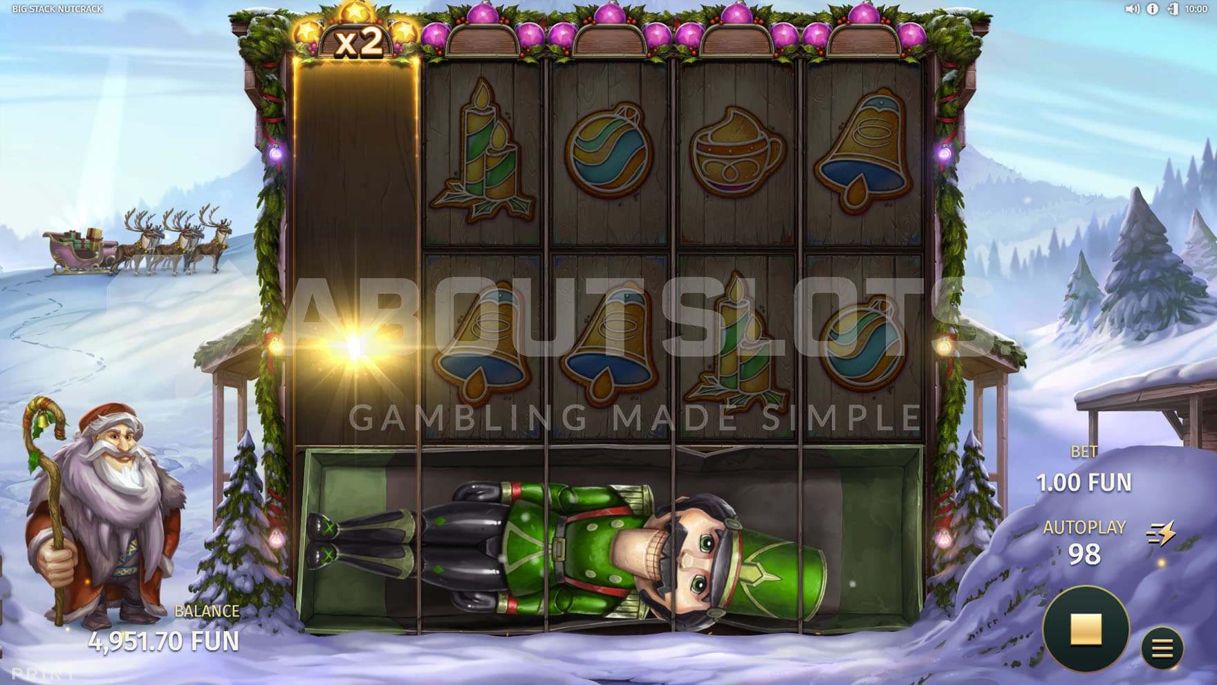 Falling Nutcrackers feature triggered in the base game, showing a Nutcracker falling to the right with an x2 multiplier.