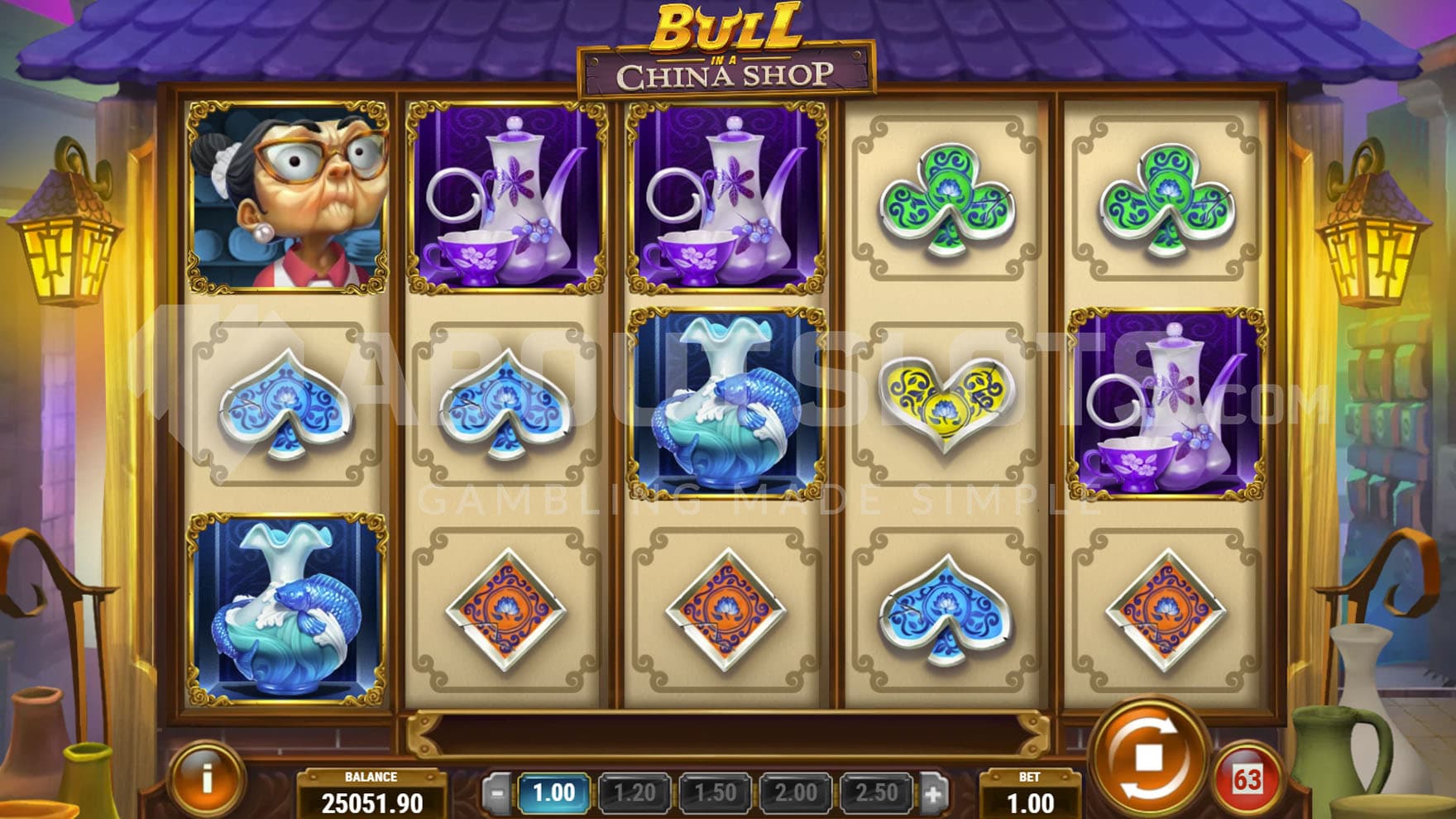 Base Game view of a 5x3 grid on a backdrop of an Asian shop with chinaware.