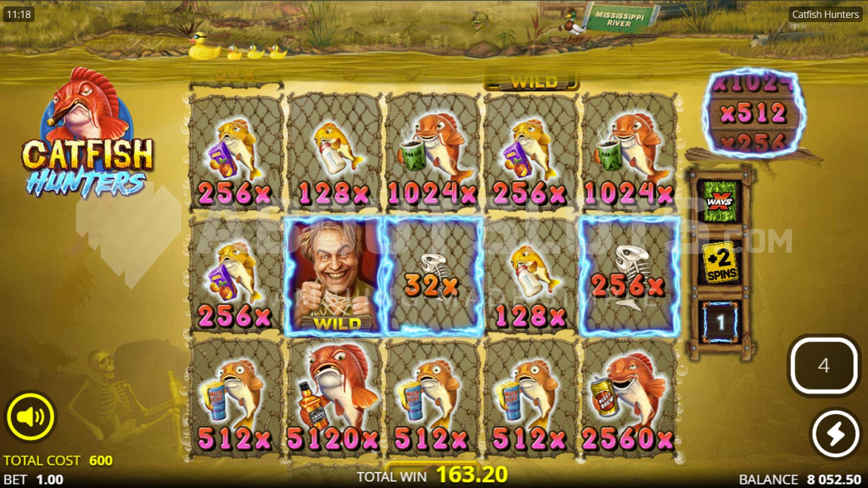 Overcharged Spins in progress, showing the entire grid covered in Fish symbols with multipliers.