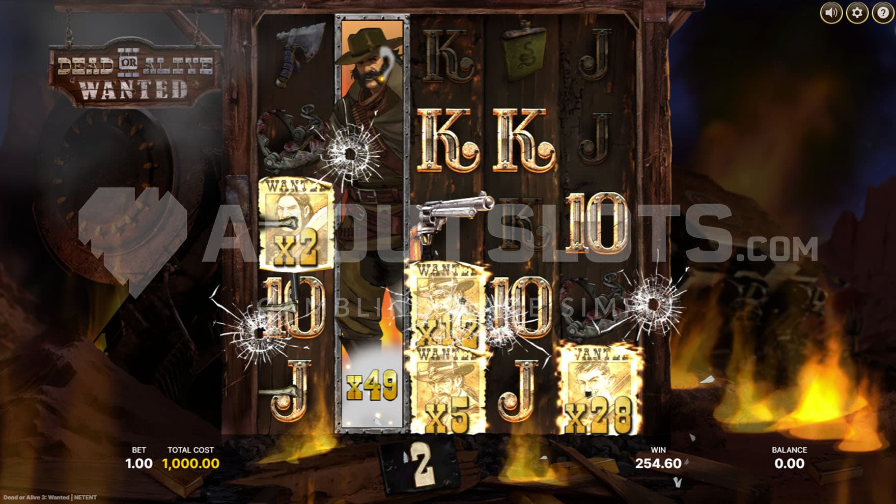 Super Free Spins bonus in progress, showing multiple Sticky Wilds with high multipliers and an expanding Wild on reel 2.