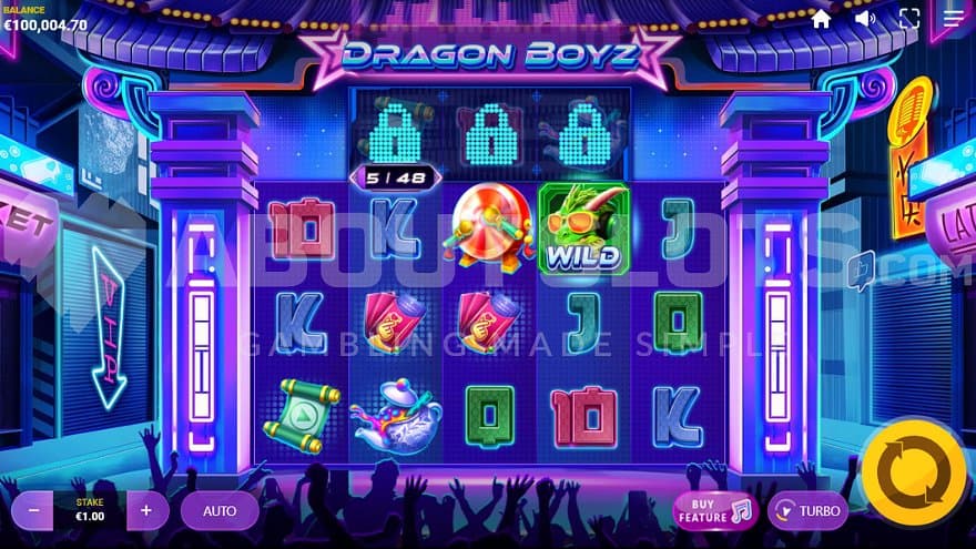 A casino slot in front of a stage.