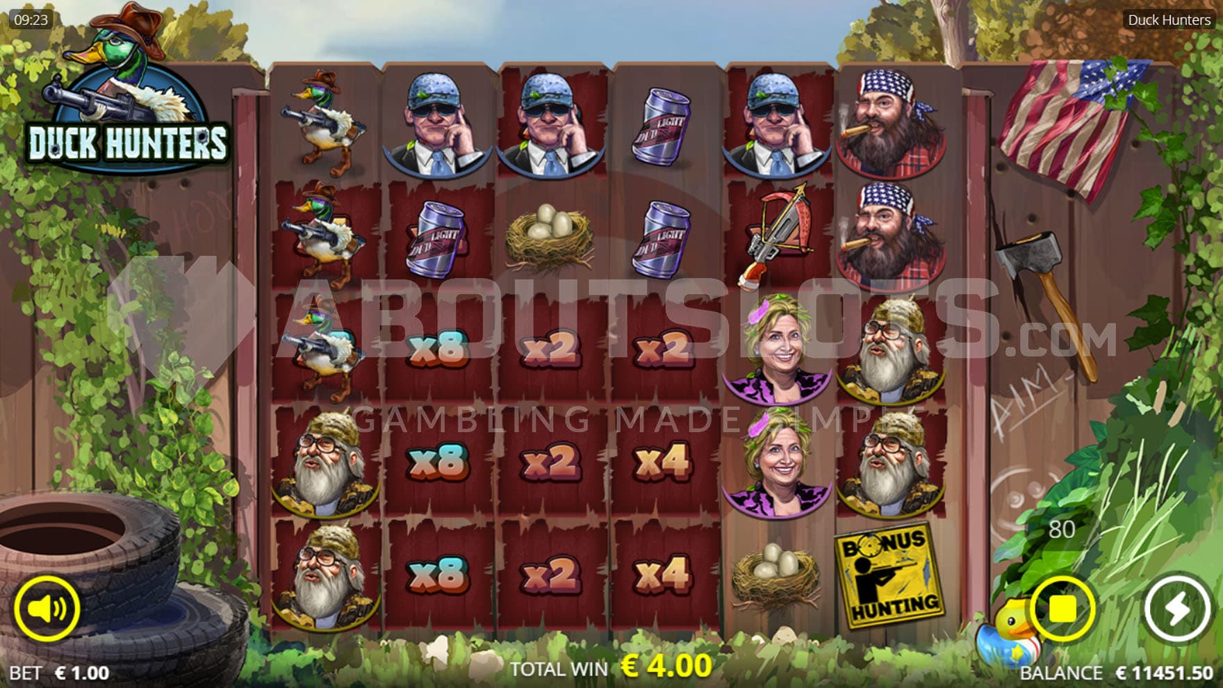 Base Game view of a 6x5 grid on a wooden fence and a natural backdrop.