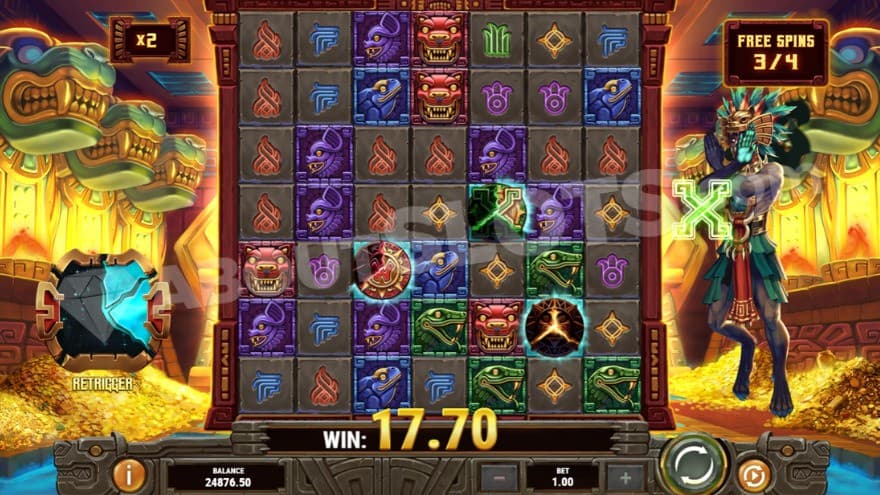 Free Spins bonus game with huge piles of gold in the background of the reels.