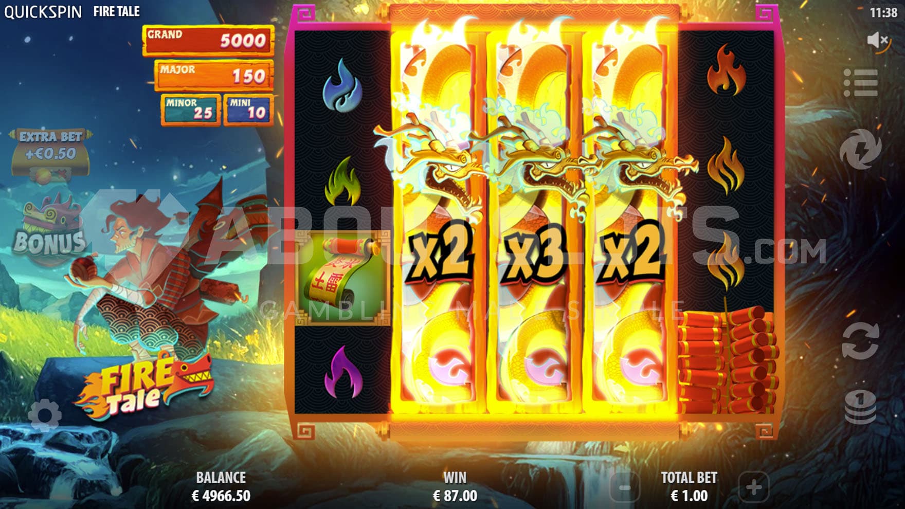 Fire Respin feature triggered in the base game, showing 3 Nudging Wilds with multipliers on three middle reels.
