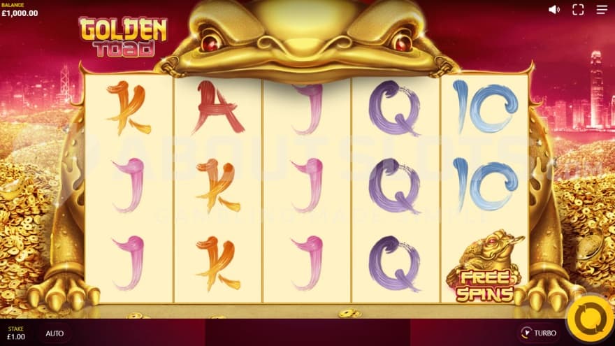 A casino slot with a golden toad behind the reels.