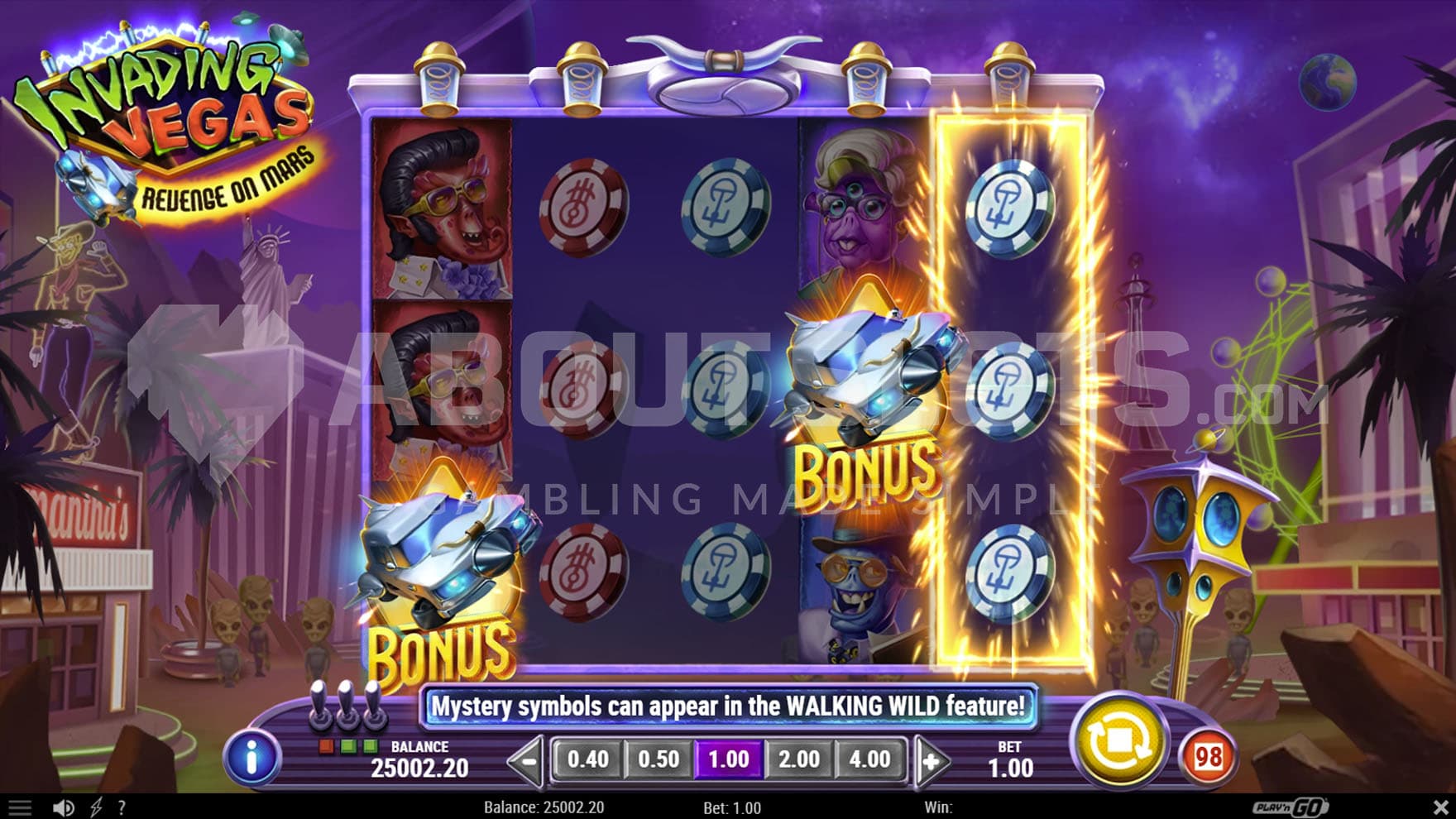 Base game view of a 5x3 on a backdrop of Las Vegas, with an anticipation sequence triggered on the grid.