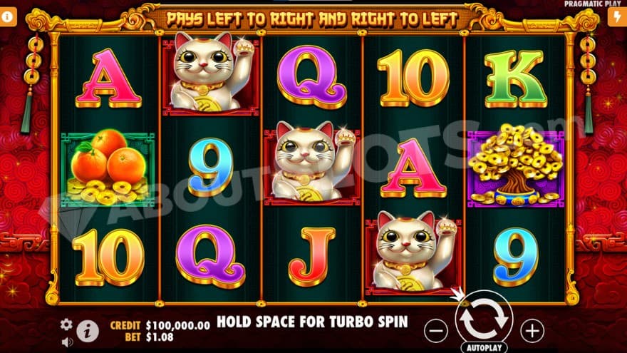 Base game where you can see three waving cats on the middle reels.