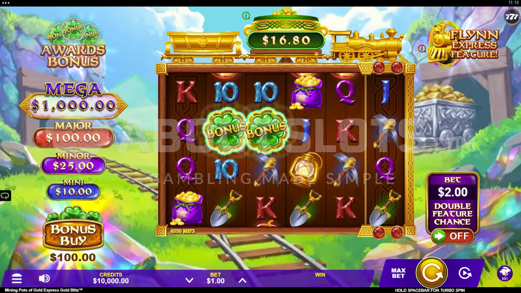 Base Game view of a 6x4 grid on a backdrop of lush, green land with a mining shaft on either side.