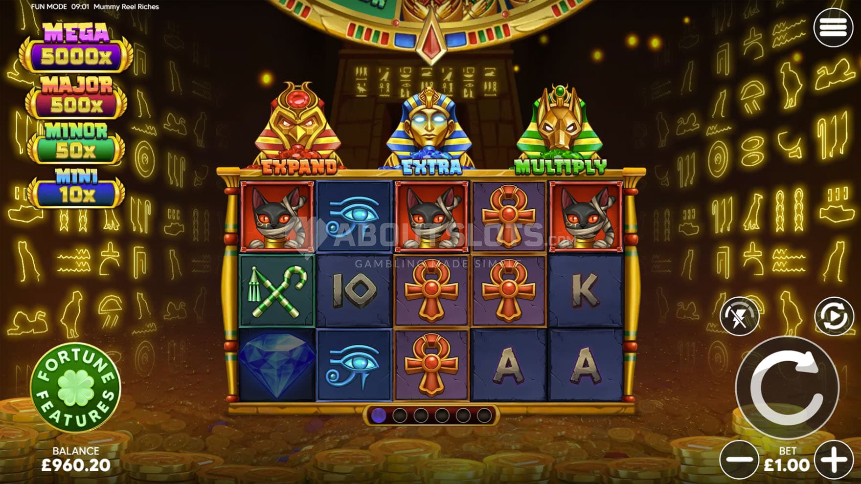 Base Game view of a 5x3 grid inside an Egyptian tomb with walls illuminated by glowing hieroglyphs.